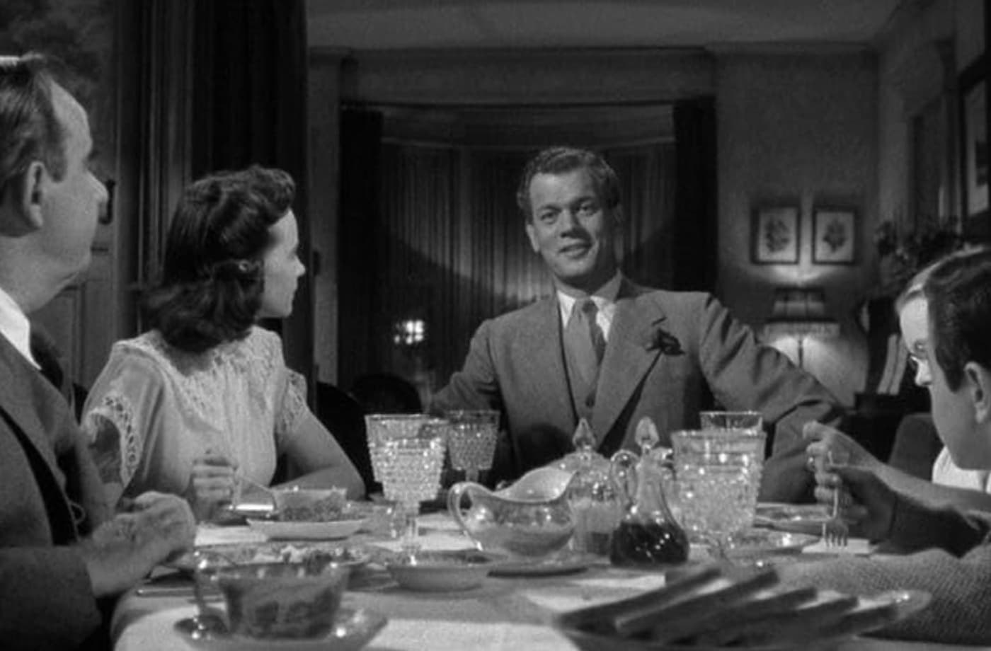 Uncle Charlie at the dinner table with his family